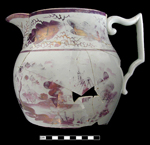 Painted landscape design in purple luster on white earthenware jug.